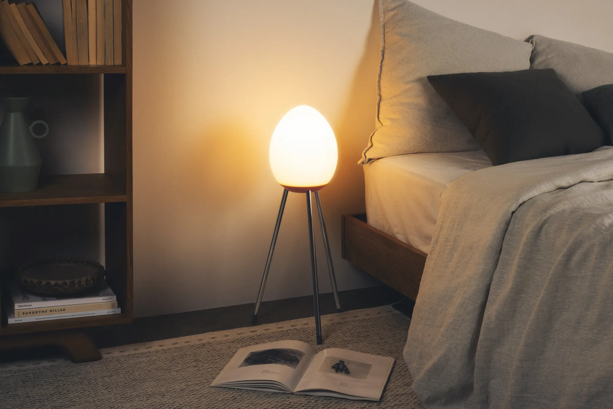 The Baltra Lantern Floor Light illuminates the space beside a bed and sets the mood for a relaxing vibe. 